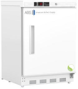 A white laboratory freezer, similar to Undercounter Refrigerators, features a front door handle, digital temperature display at -14.0°C, and a lock. The ABS American BioTech Supply logo is on the upper left, with a small green leaf icon on the lower right corner.