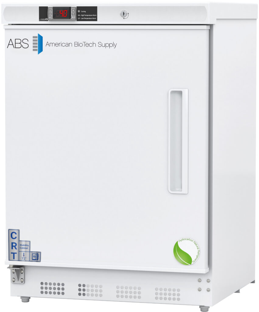 A 4.6 cu. ft. white laboratory controlled room temperature cabinet with a digital temperature display and lock on top, labeled ABS American BioTech Supply. The left hinged door has a vertical handle and a green leaf logo. CRT and hazard symbol stickers are visible on the lower left front corner.