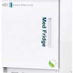 A white 4.6 cu. ft. ADA compliant pharmacy refrigerator labeled Med Fridge in blue text on the door, with American BioTech Supply and ABS logo on the top left. A small digital display and control panel are at the top. A green leaf emblem is near the bottom right corner.