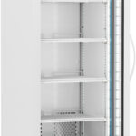 A tall, white, upright medical refrigerator with a glass door partly open, revealing five empty metal shelves inside. The unit has a digital temperature display at the top, vents at the bottom, and is mounted on four caster wheels for mobility.