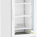 A white laboratory refrigerator with a glass door, digital temperature display showing 4.0°C, three empty shelves, interior lighting, vents at the bottom, and is set on four black caster wheels for mobility. The brand ABS is visible on the top left.