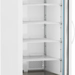 A tall, white laboratory refrigerator with a glass door is open, revealing five adjustable wire shelves inside. The digital temperature display above the door shows 4.0°C. The unit stands on wheels, and the interior appears clean and empty.