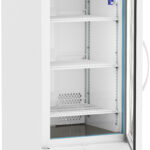 A tall, white laboratory refrigerator with a glass door is open, showing three adjustable wire shelves and a blue thermometer inside. The fridge has a digital display reading -40°C and is on four wheels. The brand ABS is visible on the upper left corner.