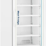An upright medical refrigerator with a glass door, digital temperature display, white exterior, five adjustable metal shelves, interior lighting, and caster wheels at the base. The door is labeled “Med Fridge” and the current temperature reads 3.4°C.
