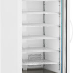 A tall, white, upright laboratory refrigerator with a glass door, several empty metal shelves, a digital temperature display, and the letters “ABS” on the top front. The unit stands on four caster wheels.
