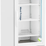A tall, white medical refrigerator with a glass door, digital temperature display, interior shelves, and Medi Fridge text. The unit has vents at the bottom, sits on four wheels, and displays the ABS logo on the upper left corner.
