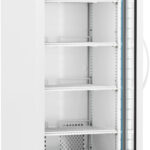 A tall, white laboratory refrigerator with a glass door is open, revealing five empty wire shelves inside. The digital temperature display above the door reads 4.0°C. The fridge stands on four wheels and has a vented panel at the bottom.