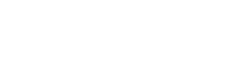 The Standex logo features three parallelograms forming a stylized S shape on the left, followed by the word Standex in bold, white letters. The background is light gray, and a small registered trademark symbol appears at the top left.