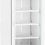 A tall, white upright laboratory refrigerator with a glass door, five adjustable wire shelves, a digital temperature display reading 4.0°C, ventilation grilles at the bottom, and small wheels for mobility. The interior is empty.