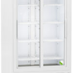 A tall, white, double-door laboratory refrigerator with glass sliding doors, empty white shelves, a digital temperature display at the top, ventilation grilles at the bottom, and mounted on four black wheels. The ABS logo is visible on the upper left.