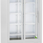 A white, upright laboratory refrigerator with glass double doors, digital display, multiple interior shelves, and ventilation at the bottom. The unit is on wheels and labeled “ABS American BioTech Supply” at the top. The inside appears empty and well-lit.