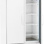 A large, white laboratory refrigerator labeled ABS American BioTech Supply with one solid door and one glass door. The glass door is open, revealing empty wire shelves and vents inside. The unit stands on wheels for mobility.