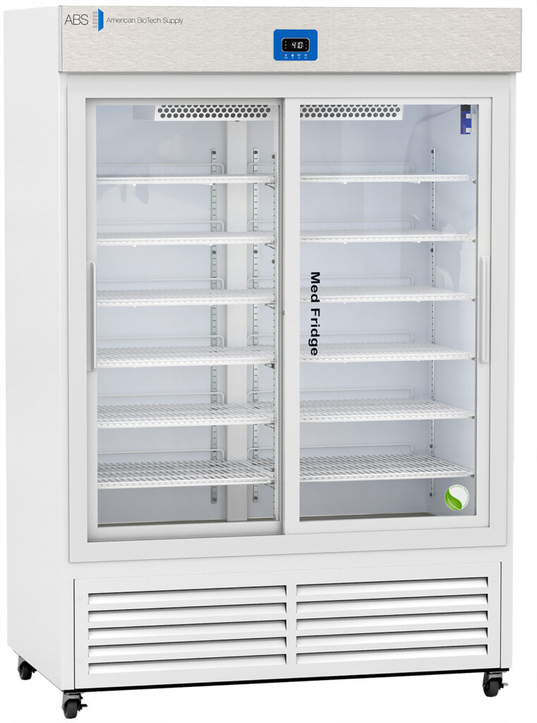 A large, white medical refrigerator with glass sliding doors, labeled “Med Fridge.” The fridge is on wheels, has multiple adjustable shelves inside, and an electronic temperature display at the top. The interior is empty and well-lit.