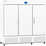 A large, white, three-door medical refrigerator with handles, a digital temperature display, and labeled Med Fridge. The exterior has vents at the bottom and a small green symbol on the lower right door. The design is modern and industrial.