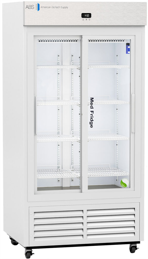 A tall, white laboratory refrigerator with glass sliding doors, digital temperature display, multiple adjustable wire shelves inside, and caster wheels underneath. The brand name “American BioTech Supply” and “Med- Fridge” text are visible on the front.