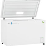 A large white chest freezer with a hinged lid open upward, revealing an empty interior. The front displays ABS American BioTech Supply and a small digital temperature display. The freezer is on four caster wheels and has a green eco-friendly logo on the front corner.