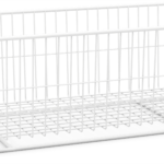 A rectangular, white wire storage basket with a grid pattern on the bottom and vertical bars on the sides. The basket is empty and sits on a plain, light background. The design is minimalist and open, allowing visibility and airflow.