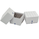 Two white cardboard boxes with removable lids, each featuring a grid and blue arrow on top. One box is open, revealing a grid of individual compartments inside; the other box is closed. Both boxes have handles on the sides and are set against a plain background.