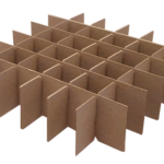 Cardboard grid divider with interlocking rectangular panels forming a 5 by 5 grid, creating 25 separate compartments. The divider is light brown and designed to organize or separate items, typically used in boxes for packaging or storage.