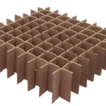 A rectangular grid made of intersecting brown cardboard strips creates a honeycomb structure with many square compartments. The cardboard dividers stand vertically and form an organized, lattice-like pattern on a white background.