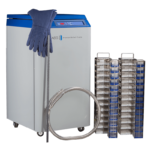 A laboratory cryogenic freezer with a blue lid and control panel, labeled American Biotech Supply, stands next to a pair of insulated gloves, a long metal rod, a flexible hose, and two metal racks with multiple blue and clear storage compartments.