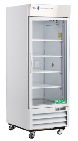 A tall, white laboratory refrigerator with a glass front door, labeled “American BioTech Supply.” It has four adjustable shelves, wheels for mobility, and a vent at the bottom. The interior is empty, and green eco-friendly labels are visible on the lower door.