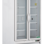 A large, white laboratory refrigerator with double glass doors, silver handles, and a stainless steel top labeled American BioTech Supply. The unit has multiple empty shelves inside and sits on four caster wheels for mobility.