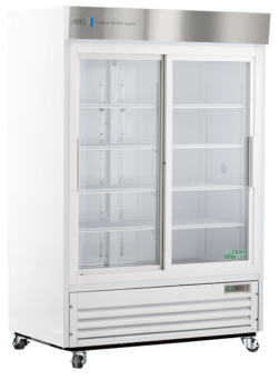 A large, white commercial refrigerator with glass sliding doors, interior shelves, a metal vent at the bottom, and wheels. The top has a silver panel labeled “American BioTech Supply.” The fridge appears empty and is suitable for storage or display.