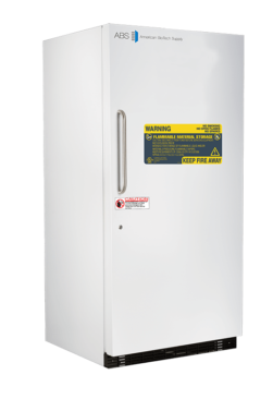 A white upright laboratory freezer with a vertical handle, labeled “American Biotech Supply.” Warning labels on the door indicate it is for flammable material storage and to keep fire away. The freezer stands alone against a plain white background.