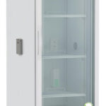 A tall, white laboratory refrigerator with a glass door, three shelves, a digital control panel on top, and ABS branding. The unit stands on four caster wheels, and the lower front has ventilation slats. The interior is empty, except for a small box on the bottom shelf.