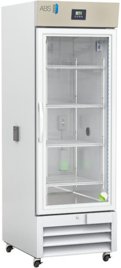 A tall, white medical refrigerator with a transparent glass door, metal handle, and digital temperature display on top. Inside are four wire shelves, a power outlet, and a few small items. The unit has vents and wheels at the base.