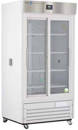 A tall, white, commercial refrigerator with double glass doors, metal frame, and visible shelves inside. It has a digital temperature display on the top, vents at the bottom, and is mounted on four wheels for mobility.