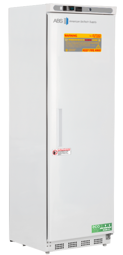 A tall, white, upright laboratory freezer from American BioTech Supply. The door displays several safety stickers, including warnings and an eco-friendly label at the bottom. The freezer has a vertical handle and ventilation slots near the base.