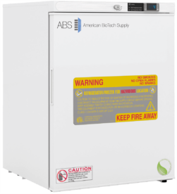 A white American BioTech Supply Hazardous Location Undercounter Refrigerator features a digital display, large yellow and red hazardous location warning label reading “KEEP FIRE AWAY,” and an additional caution label on the lower left front door.