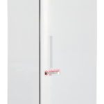 A tall, white, upright Standard Hazardous Location Refrigerator by American BioTech Supply ABS features warning labels on the door, a right-side handle, bottom ventilation, top control panel, and eco-friendly stickers for added safety and compliance.