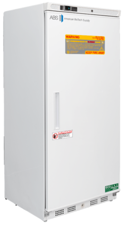 A tall, white laboratory freezer by American BioTech Supply with a solid front door, warning labels, and a rectangular handle. The top label is orange with safety instructions, and a small caution label appears below the handle. Vents are at the bottom.
