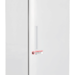 A tall, white, upright laboratory refrigerator by American BioTech Supply with digital controls, warning labels about flammable material storage, and a “Keep Fire Away” sign on the upper door. The lower door has a caution label and an eco-friendly sticker.
