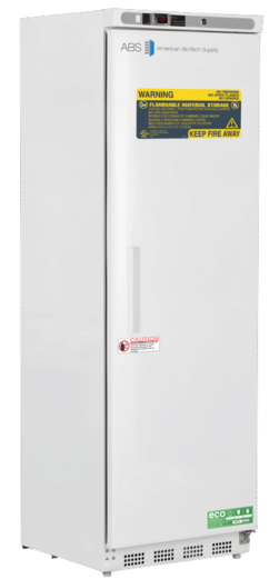 A tall, white, upright laboratory refrigerator by American BioTech Supply with digital controls, warning labels about flammable material storage, and a “Keep Fire Away” sign on the upper door. The lower door has a caution label and an eco-friendly sticker.