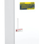 Tall, white, upright laboratory freezer with a digital display panel on top. The door has multiple warning labels, including a yellow “Flammable Material Storage” sign and a red caution label. The freezer is branded “American BioTech Supply.”