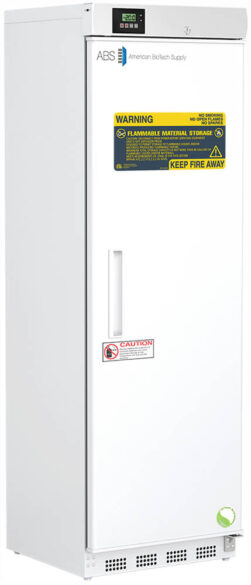 A tall, white laboratory refrigerator with a digital temperature display on top, warning labels about flammable material storage, a vertical handle, and vent grilles at the base. The brand “American BioTech Supply” is visible near the top.
