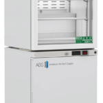 A white, double-unit laboratory refrigerator and freezer from American BioTech Supply. The upper section has a glass door, shelves, and digital display. The lower section has a solid door and its own digital display. Both feature eco-friendly labels.