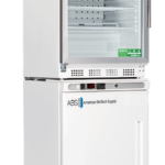 A white, two-compartment laboratory refrigerator-freezer unit with transparent top door and solid bottom door. The top section has shelves and a digital display. Both sections display “American BioTech Supply” branding and eco-friendly labels.