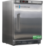 A stainless steel American BioTech Supply lab freezer with a single front door, horizontal handle, digital temperature display showing -20°C, eco-friendly stickers, and vents at the base. The logo and brand name are visible on the top left of the door.