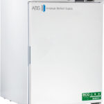 A white upright medical freezer labeled ABS American BioTech Supply, with a digital temperature display showing -20°C, a handle on the left, and eco-friendly certification stickers on the bottom right of the door.