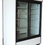 A large, white commercial refrigerator with glass double doors, four wire shelves inside, and black trim. The display panel and ABS American Biotech Supply logo are visible at the top right. The unit sits on wheels for mobility.
