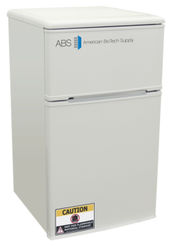 A white General Purpose Refrigerator Freezer Combination with two compartments, labeled “ABS American BioTech Supply.” A yellow caution sign and a notice reading “Not for flammable material storage” are on the lower door.