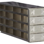 A metal organizer with four rows and four columns, featuring four pull-out drawers on the right side. Each drawer has a handle with a slot for labels. The organizer appears sturdy and is suitable for storing small tools, parts, or hardware.