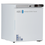 A white American BioTech Supply medical refrigerator with a digital display showing 72, company logo on the door, a side handle, small control panel on top right, CRT and temperature stickers, all standing on short black feet against a plain background.