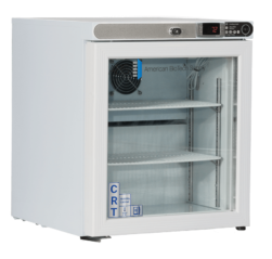 A small 1 cu. ft. freestanding, white medical controlled room temperature cabinet with a glass left hinged door shows metal shelves and a cooling fan inside. The digital control panel above the door displays “72.” Blue labels on the door read “CRT.” The unit is on black feet and labeled “American BioTech Supply.”