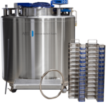 A large, cylindrical stainless steel cryogenic storage tank labeled American BioTech Supply stands beside racks filled with blue-capped storage boxes and a coiled metal transfer hose, against a plain white background.